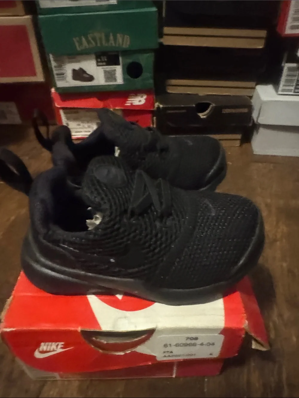 Nike Kids All-Black Mesh Lace-Up Sneakers